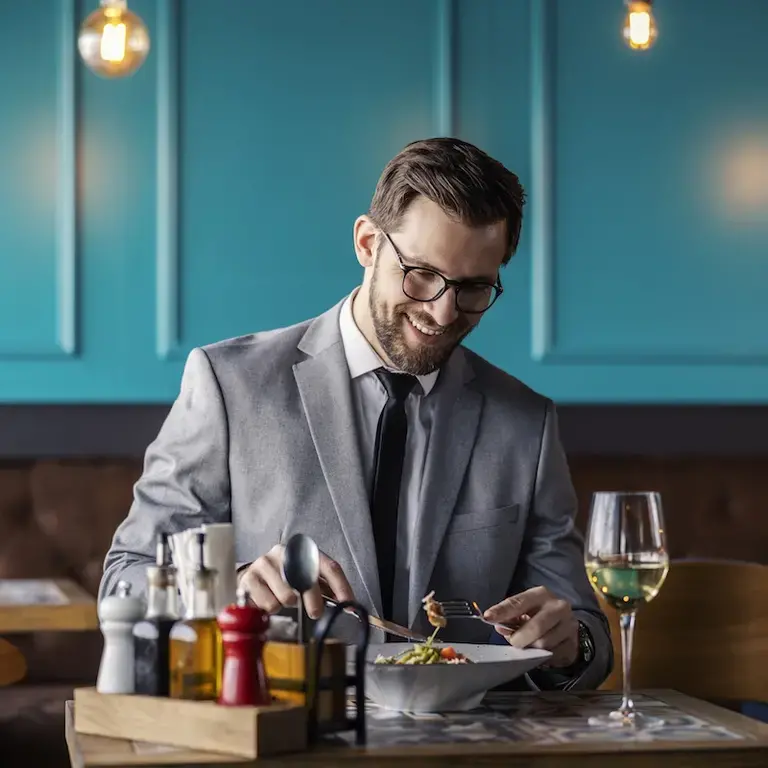 Business man enjoying alone lunch experience