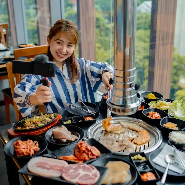 Girl having a video call while eating meal