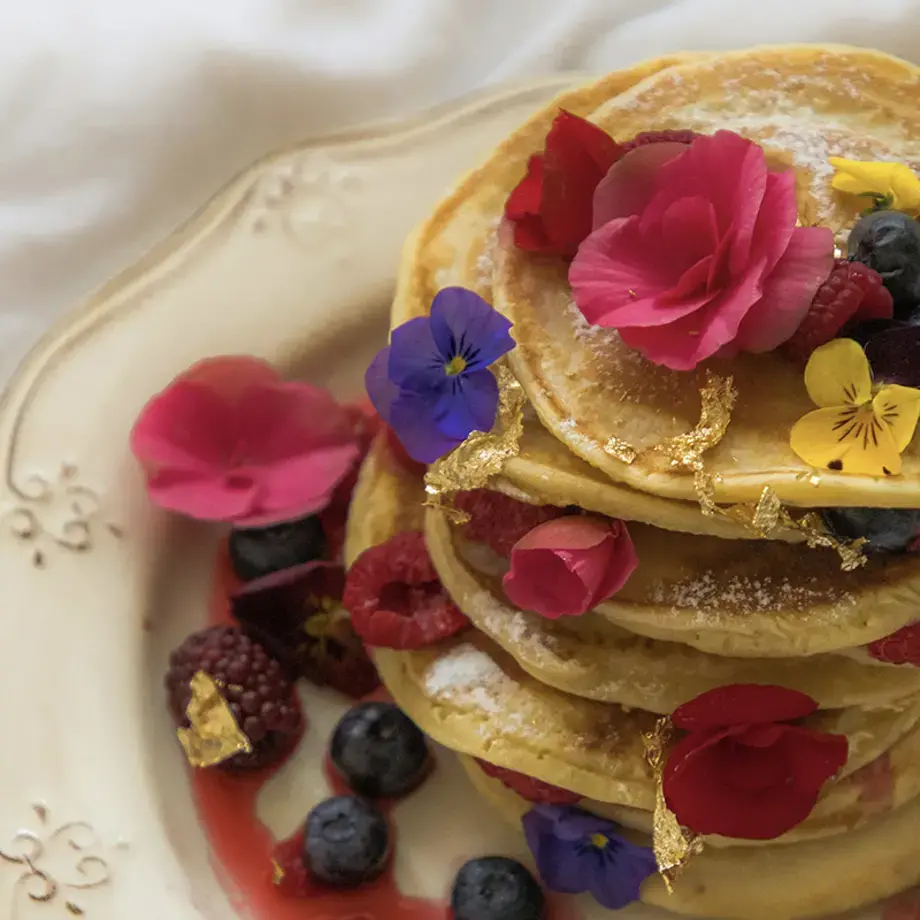 Pancakes and edible flowers.