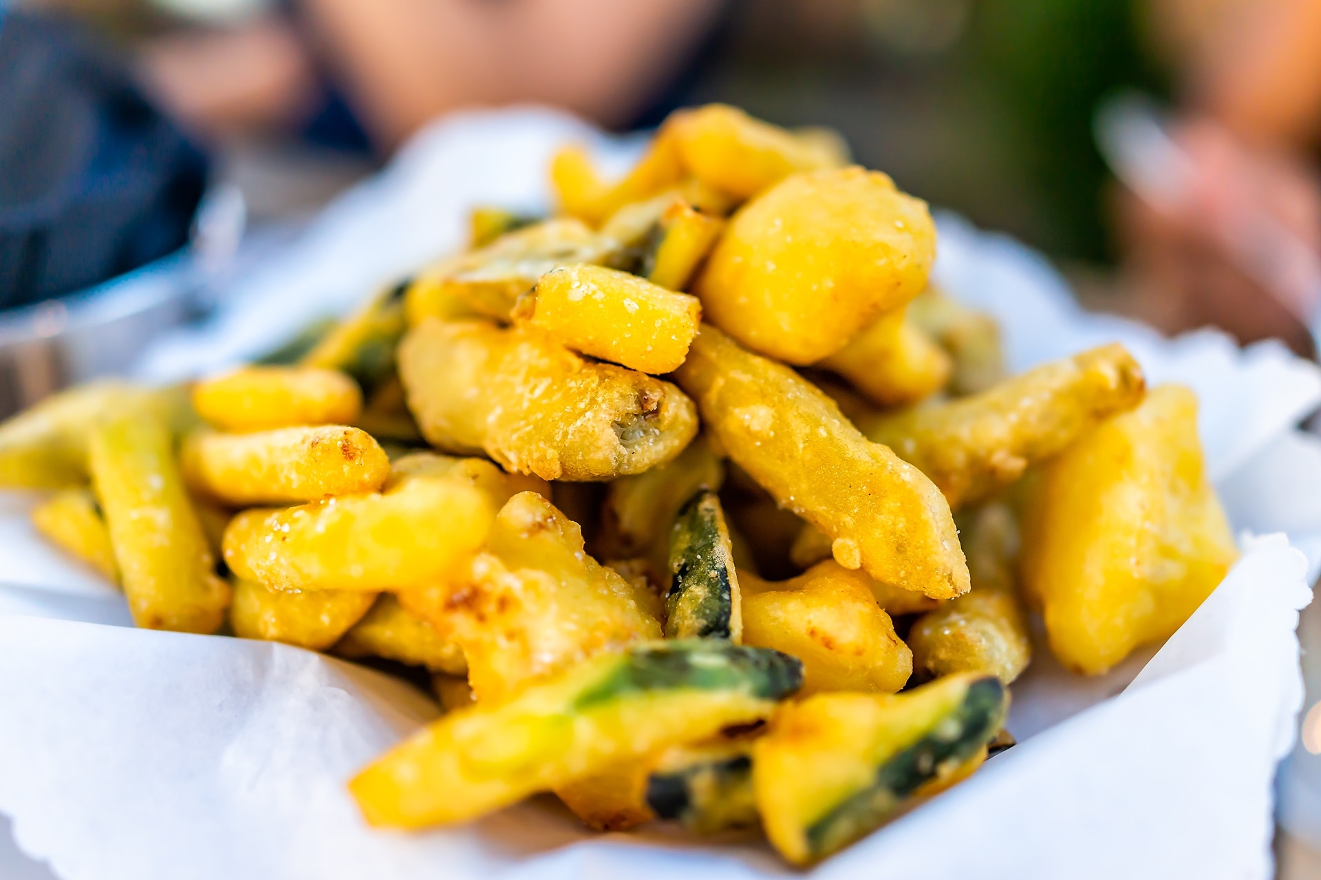 a heap of fried fish on a plate