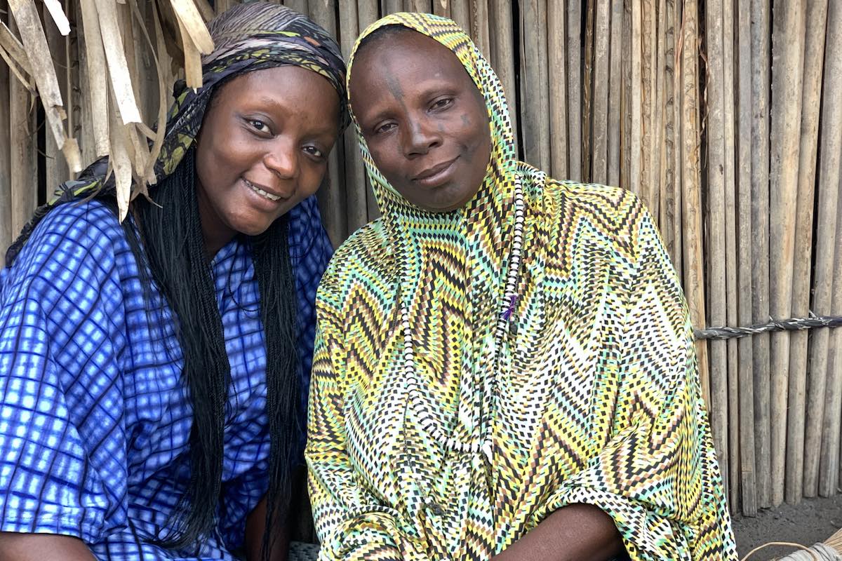 Chef Fatmata Binta with a woman.